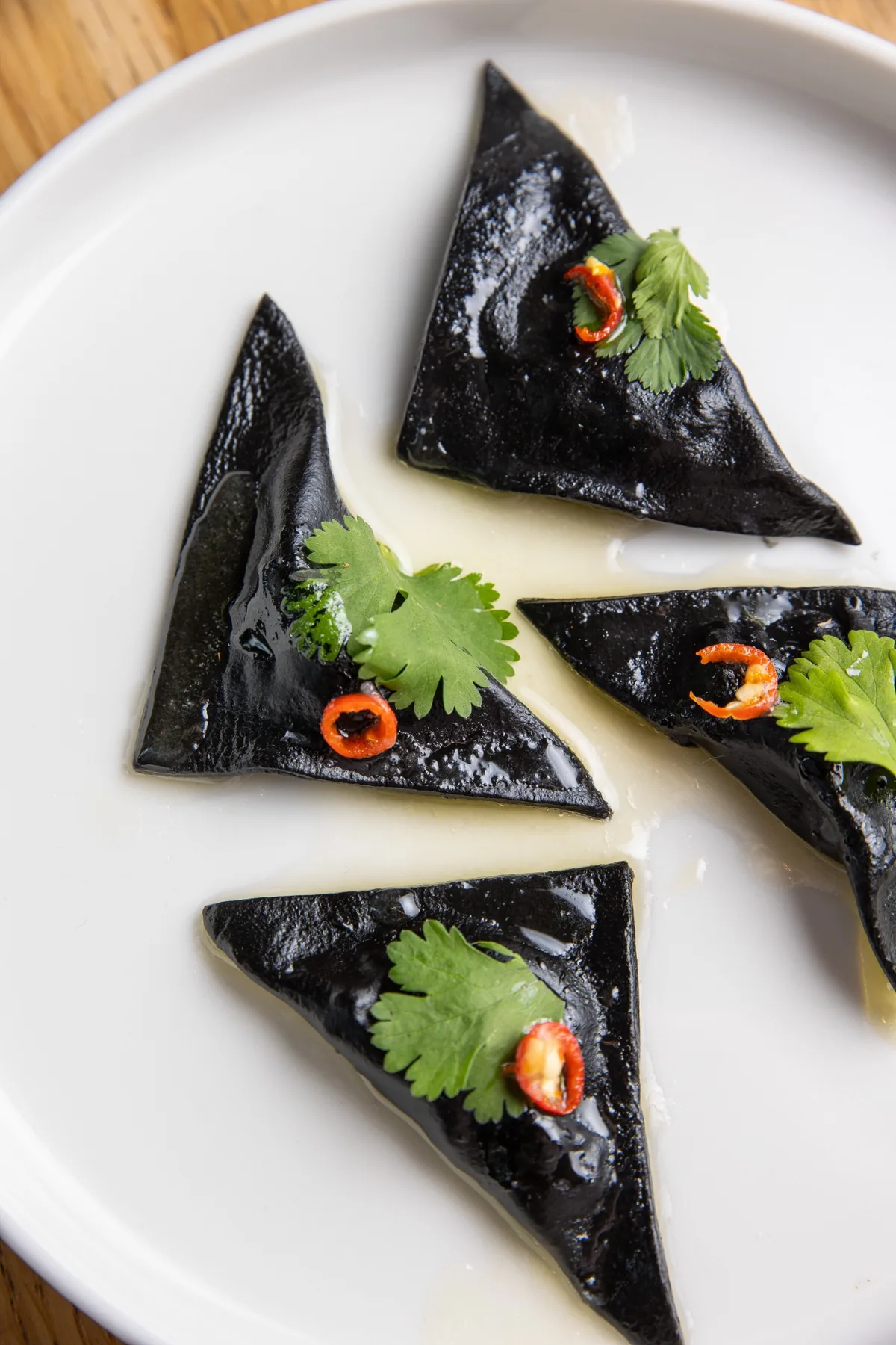 Ravioli Nero z krewetkami w Lesu